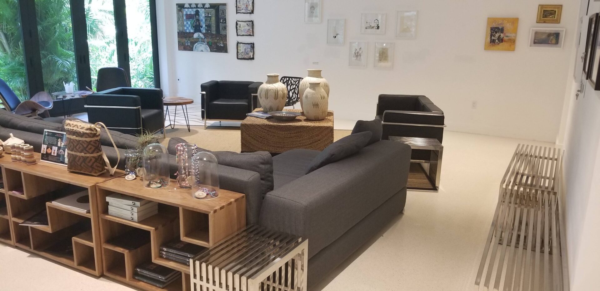 A living room with many different furniture and accessories.