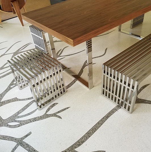 A table with two benches and a tree floor