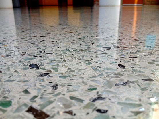 A close up of the floor with many glass pieces