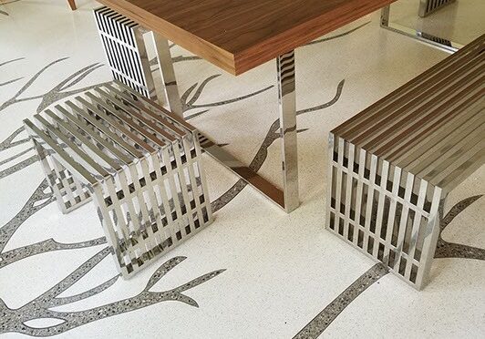 A table with two benches and a tree floor